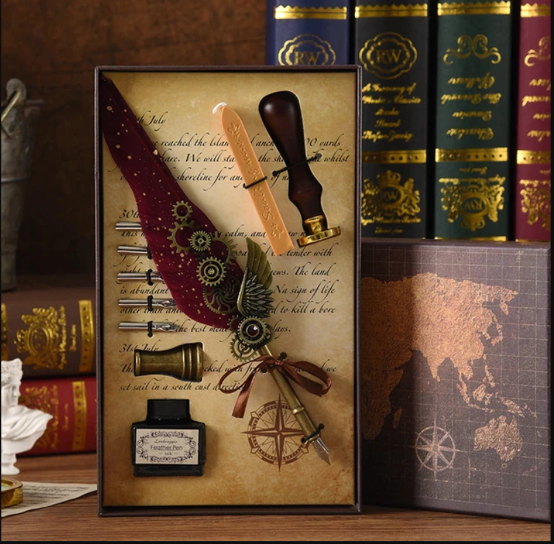 Fountain pen with interchangeable nibs, stand, and wax candle with sealing stamp/mold