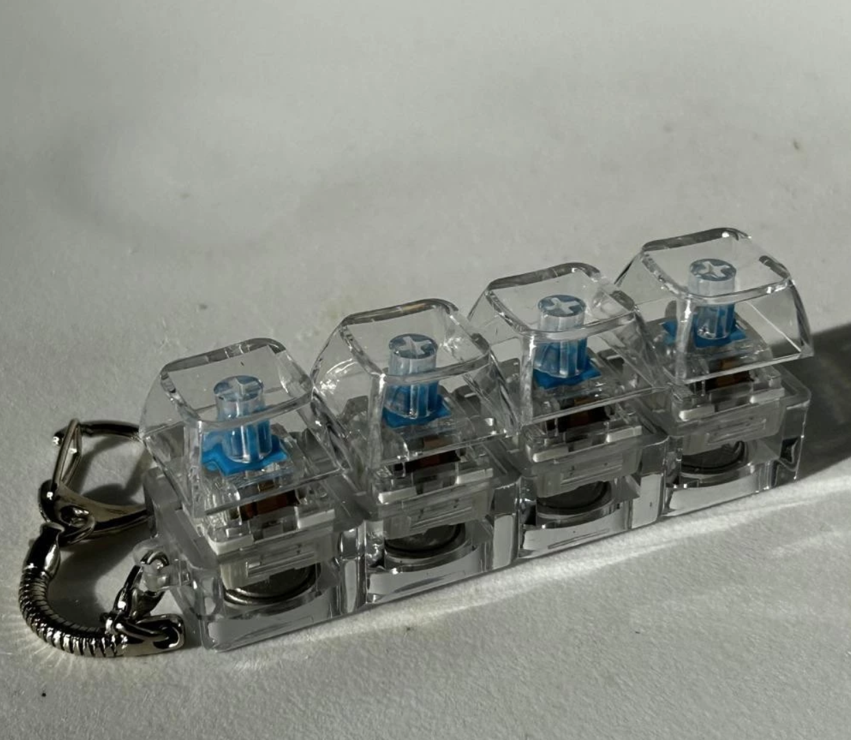 Keychain, 4 Key Finger Keyboard for Stress Relief.